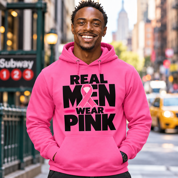 Model wearing a pink Real Men Wear Pink breast cancer awareness hoodie in NYC